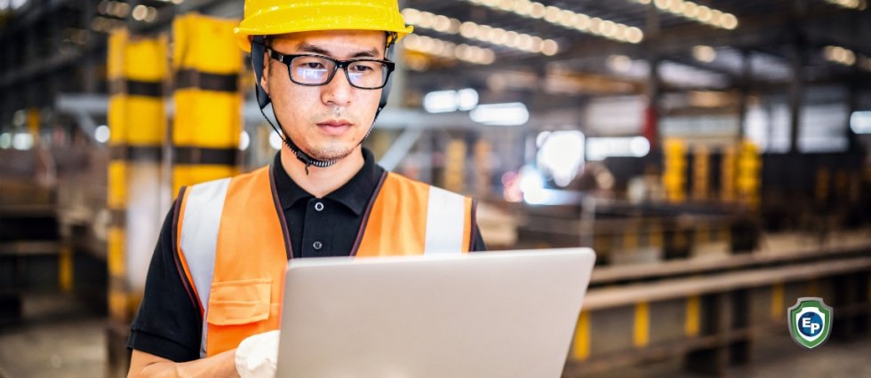 Man reviewing information on a clipboard