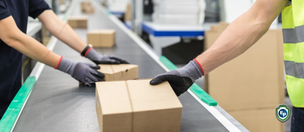 Warehouse workers using conveyor belt